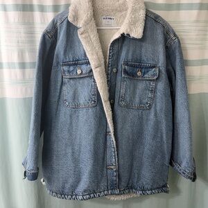 Fur lined denim trucker jacket